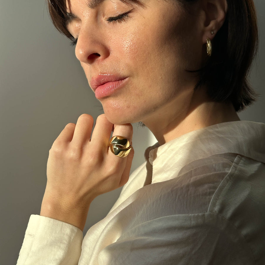 Anello intreccio in oro giallo