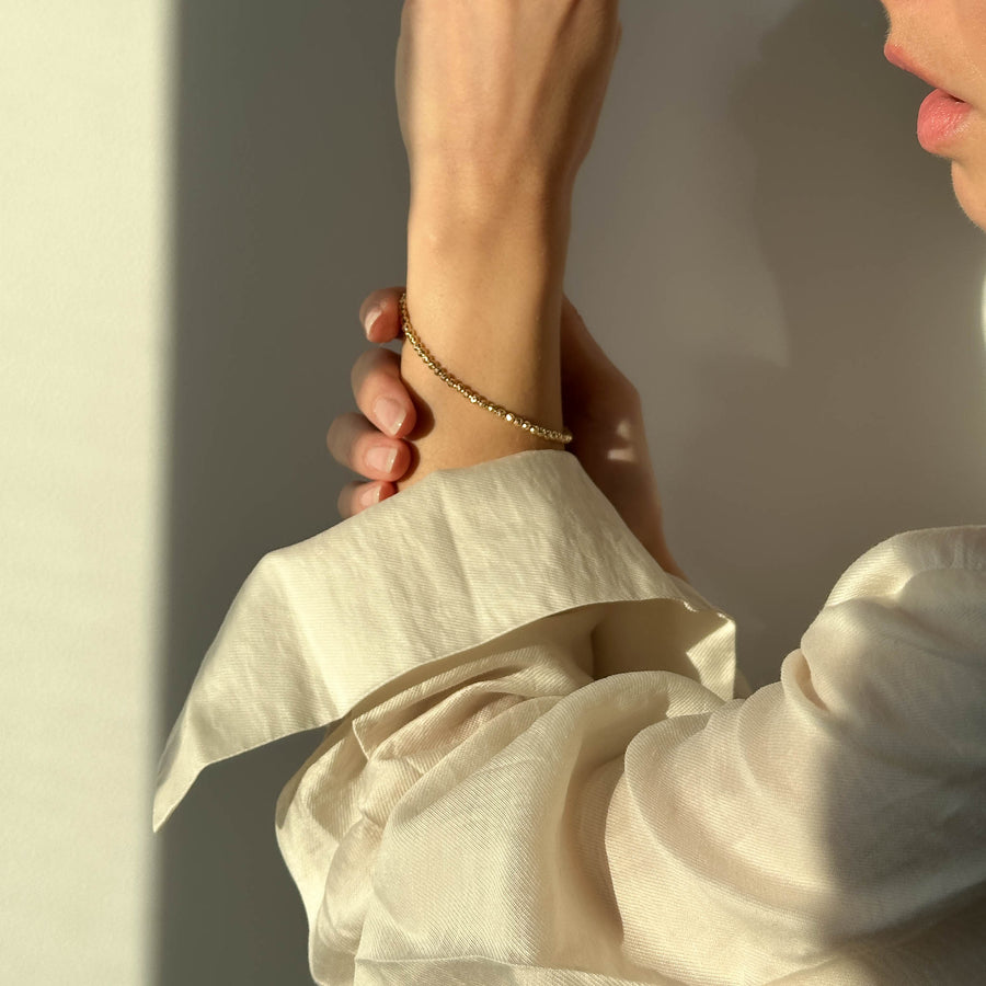 Bracciale sfere diamantate in oro giallo